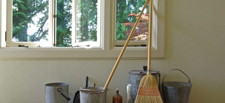 Vintage cleaning supplies in room with an open window.